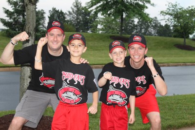 Mud Cats Little League baseball team players and two members of the coaching staff