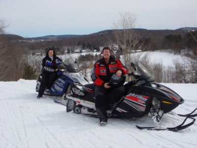 Jackie and Jeff Gregory snowmobiling